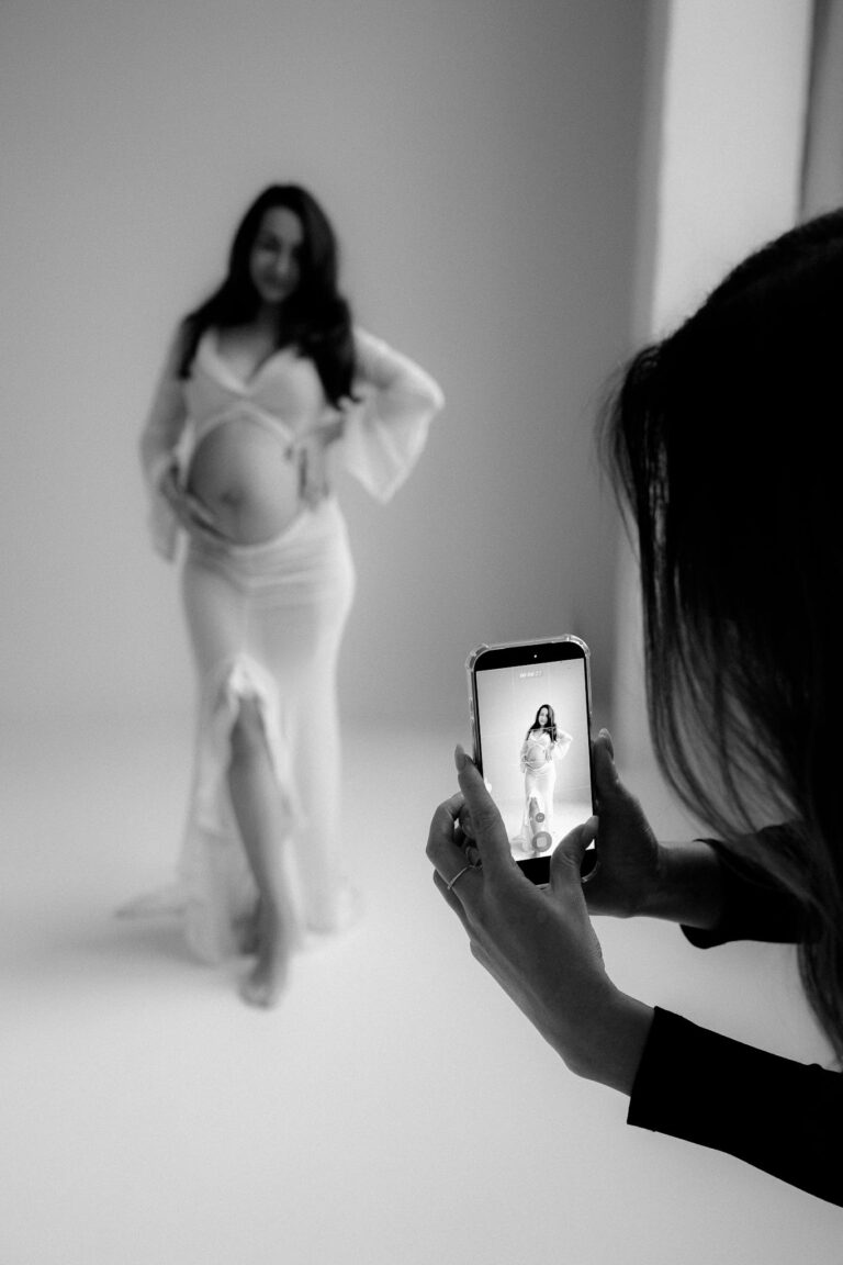 Monochrome maternity photoshoot session capturing elegance and anticipation.